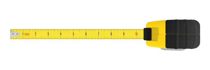 Yellow carpenter measuring tape with an imperial units scale. - Metrology